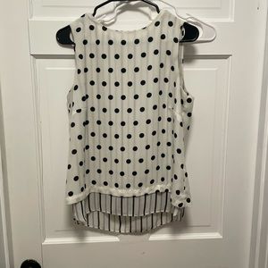 Black and white sleeveless blouse medium